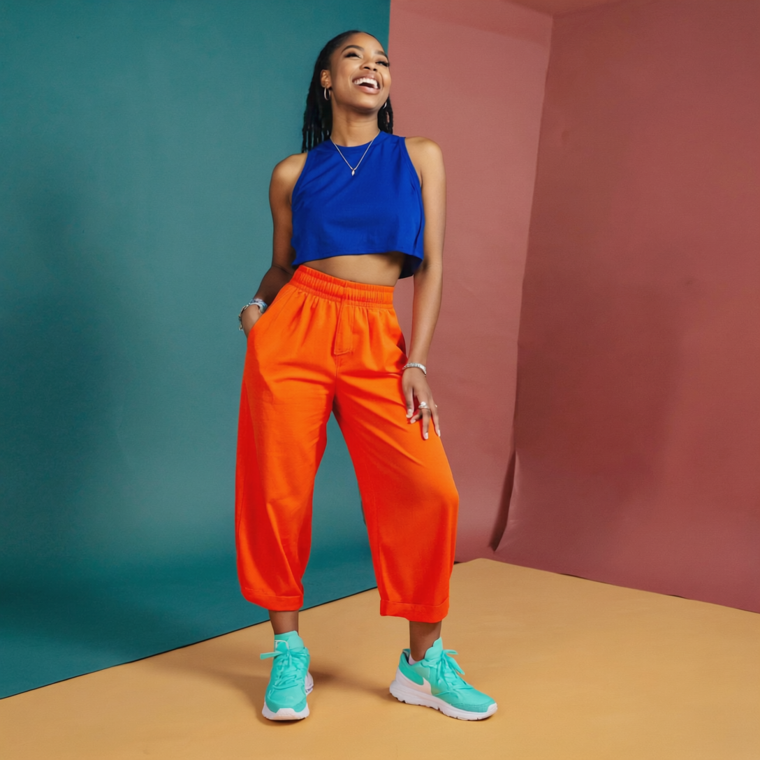 candid and authentic portrait of a confident woman in a bold colorful out
